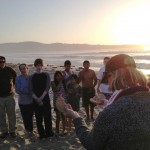 Youth from Macon, Seaside, and Watsonville at Eucharist on the beach in Monterey with Bishop Mary.
