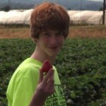 Christian in the fields in Watsonville. Fresh strawberries!